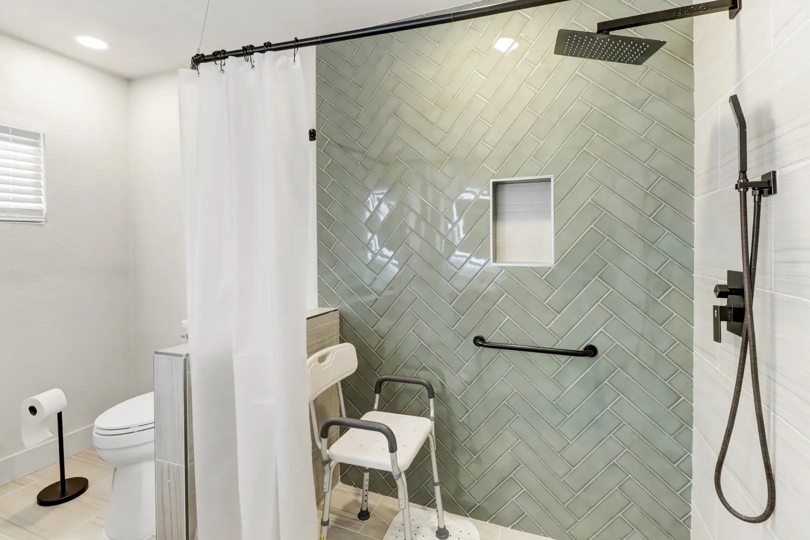 Accessible bathroom with safety features at Sophie's Homecare